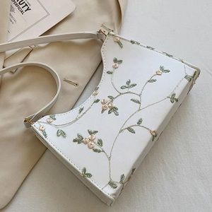 Embroidered white purse
